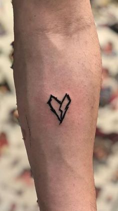 Geometric Broken Heart Tattoo on Forearm